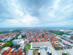Comfort Studio Room at Mekarwangi Square Cibaduyut Apartment By Travelio